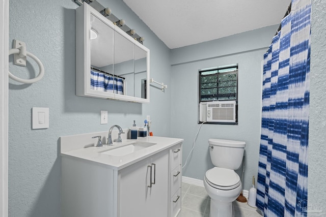 6136 Beasley Rd, Crestview, FL 32536 - bathroom featuring cooling unit, vanity, and tile patterned floors