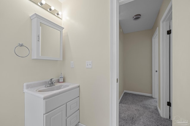 6136 Beasley Rd, Crestview, FL 32536 - bathroom featuring vanity and baseboards