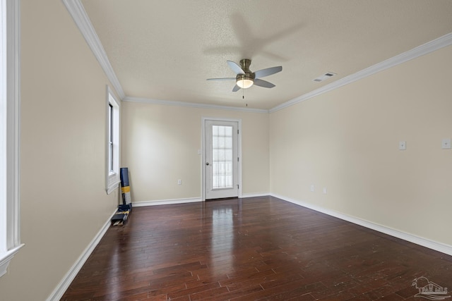 6136 Beasley Rd, Crestview, FL 32536 - spare room with a ceiling fan, wood-type flooring, and crown molding