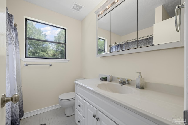 6136 Beasley Rd, Crestview, FL 32536 - bathroom with vanity, tile patterned floors, and a shower with curtain