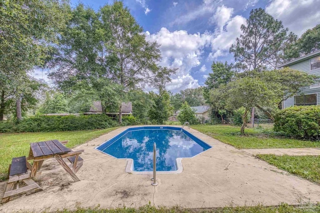 6136 Beasley Rd, Crestview, FL 32536 - outdoor pool with a patio and a lawn