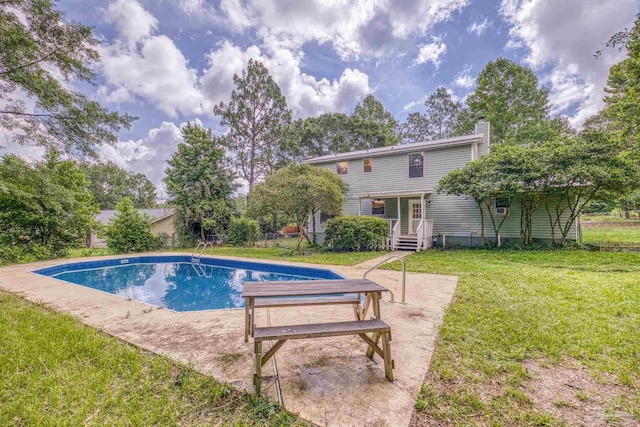 6136 Beasley Rd, Crestview, FL 32536 - outdoor pool with a yard