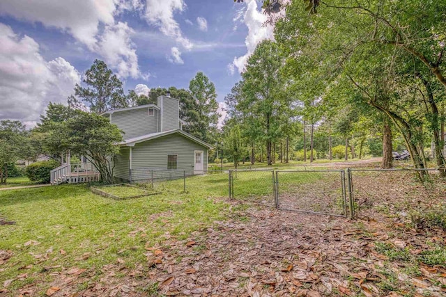 6136 Beasley Rd, Crestview, FL 32536 - view of yard featuring a gate