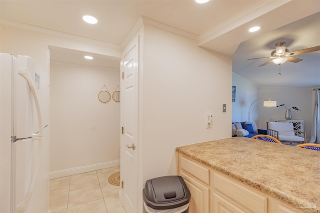 bathroom with ceiling fan, tile patterned flooring, and crown molding