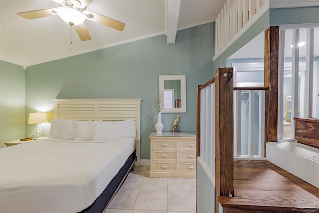 bedroom with ceiling fan and light tile patterned floors