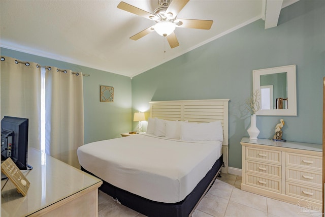 bedroom featuring ceiling fan, light tile patterned floors, crown molding, and vaulted ceiling