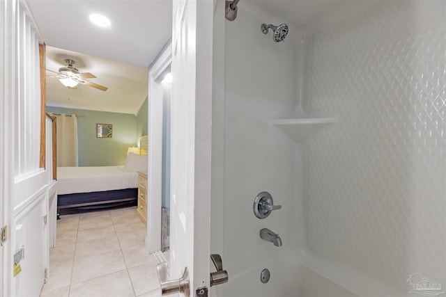 bathroom with ceiling fan, tub / shower combination, and tile patterned flooring