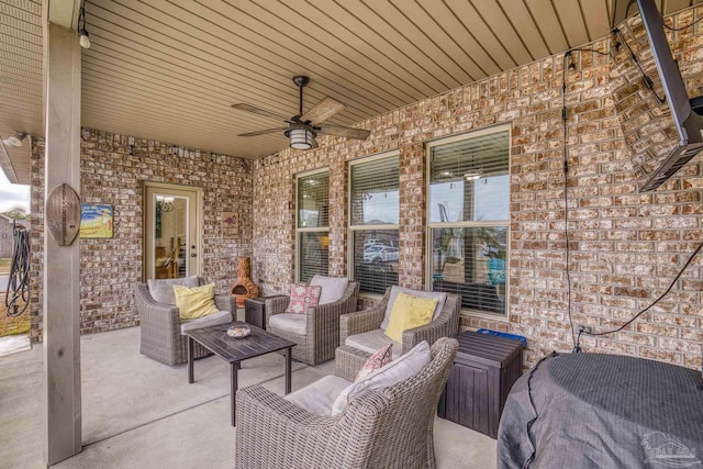 view of patio featuring outdoor lounge area and ceiling fan