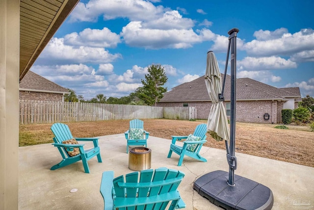 view of patio / terrace with an outdoor fire pit