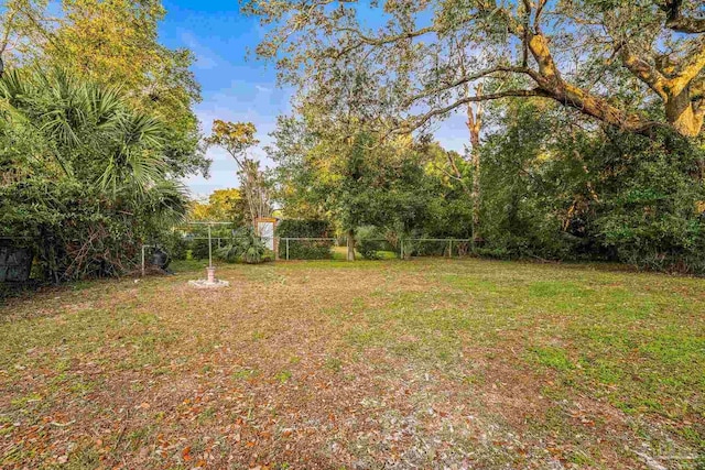 view of yard with fence