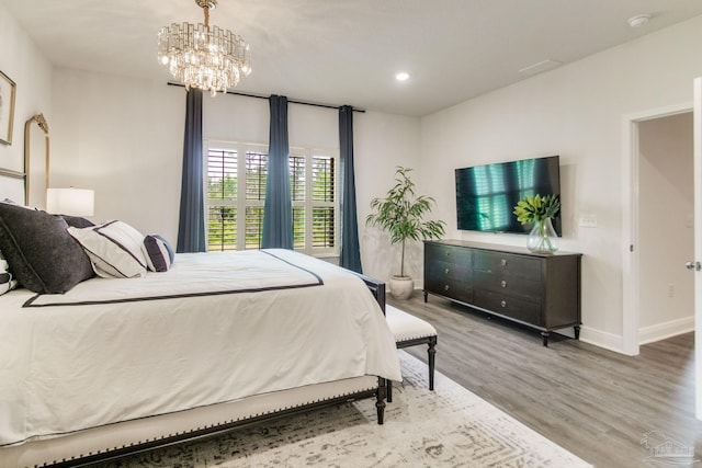 7926 Burnside Loop, Pensacola, FL 32526 - bedroom with wood finished floors, baseboards, recessed lighting, and a chandelier