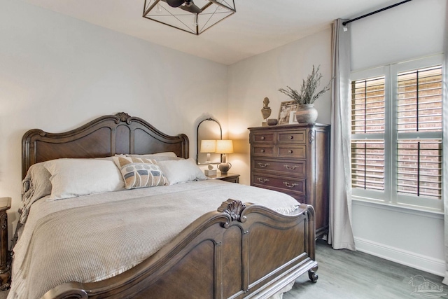 7926 Burnside Loop, Pensacola, FL 32526 - bedroom with light wood finished floors and baseboards