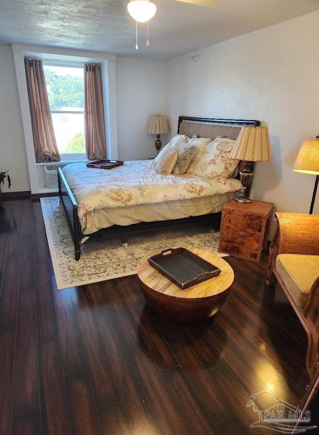 bedroom featuring hardwood / wood-style flooring