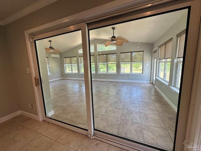 doorway to outside with lofted ceiling, ceiling fan, and light tile patterned flooring