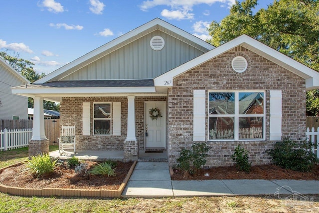 front facade featuring covered porch