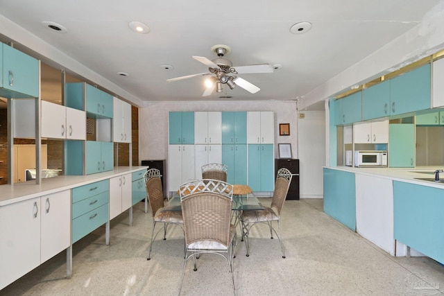 dining room with ceiling fan