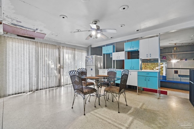 dining area featuring ceiling fan