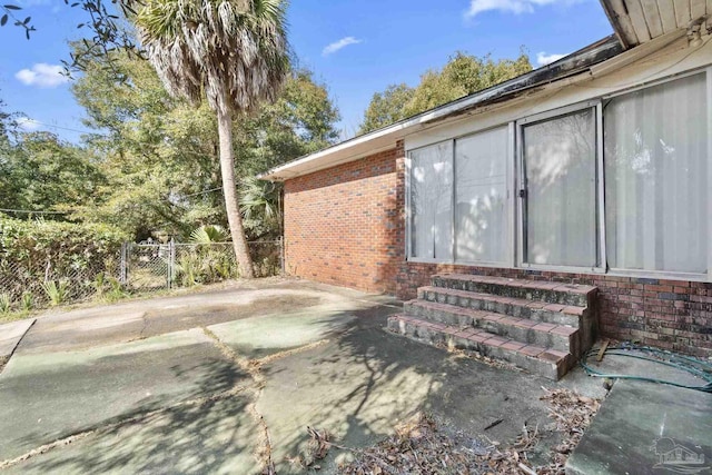 view of property exterior featuring a patio