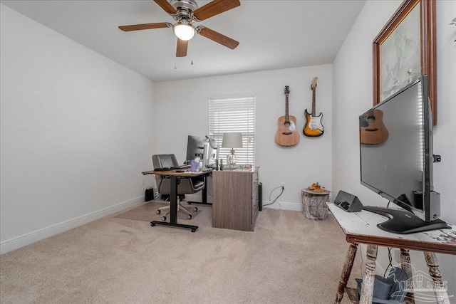 office space featuring carpet floors and ceiling fan