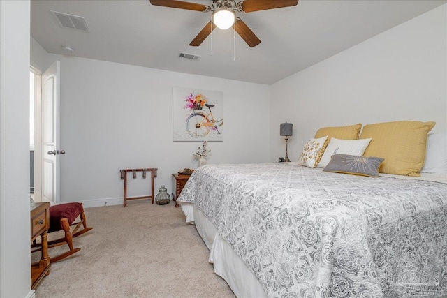 bedroom featuring ceiling fan and light colored carpet