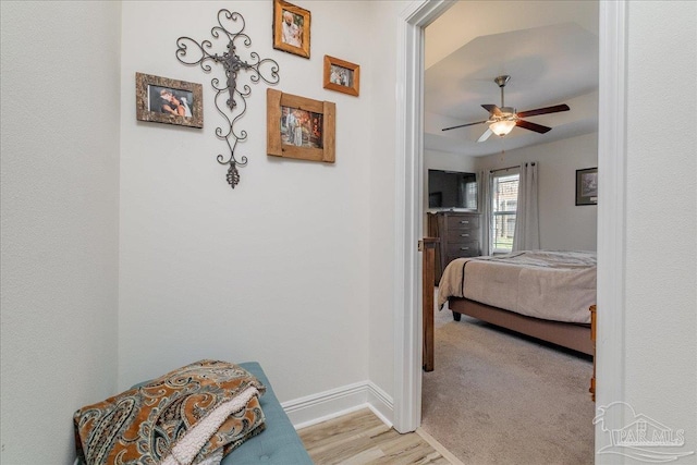 bedroom featuring light wood-type flooring and ceiling fan