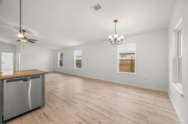 kitchen featuring a healthy amount of sunlight, visible vents, ceiling fan with notable chandelier, and dishwasher