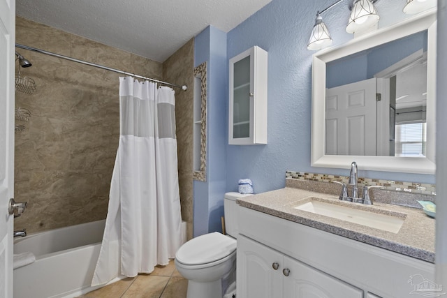 full bathroom with shower / tub combo with curtain, vanity, toilet, tile patterned floors, and a textured ceiling