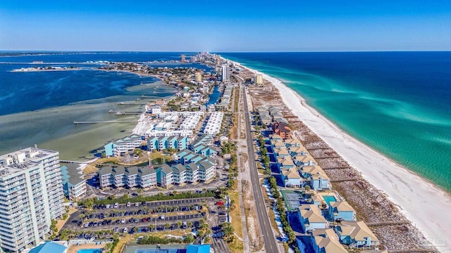 bird's eye view with a water view and a view of the beach