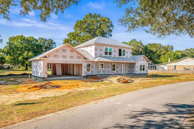 property under construction featuring a front yard