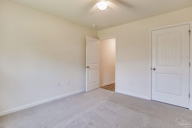4642 Perception Cir, Milton, FL 32570 - unfurnished bedroom featuring carpet floors, baseboards, and a ceiling fan