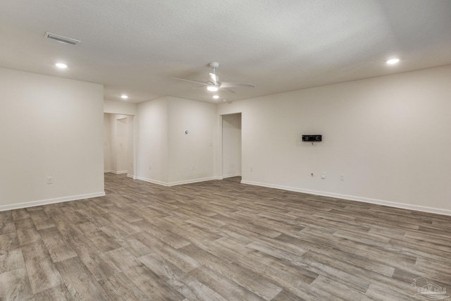 4642 Perception Cir, Milton, FL 32570 - unfurnished room with ceiling fan, recessed lighting, wood finished floors, and baseboards
