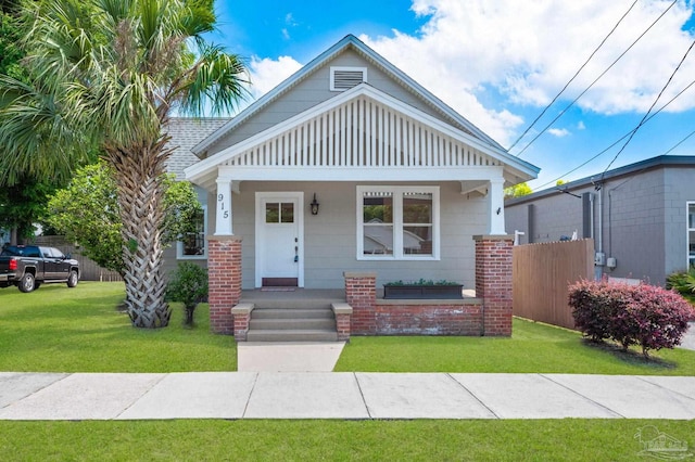 view of front of home with a front lawn