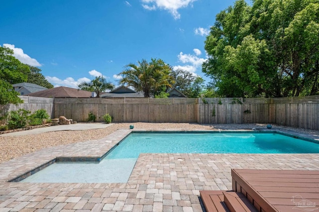 view of pool with a patio