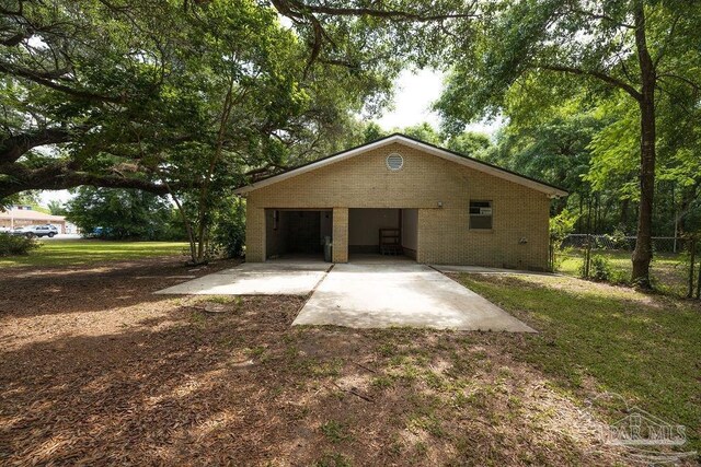 exterior space featuring a carport