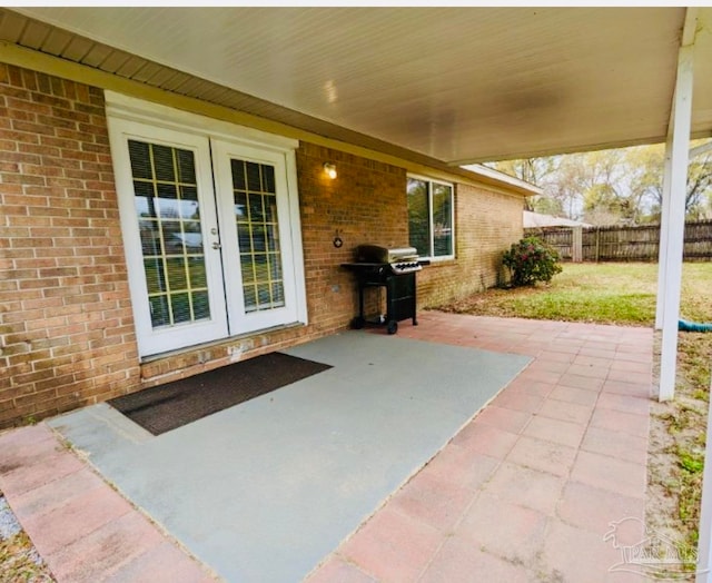 view of patio / terrace with french doors and a grill