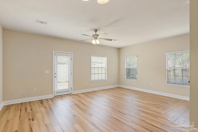 8868 Sanderling Ln, Navarre, FL 32566 - unfurnished room featuring ceiling fan, light wood-style flooring, and baseboards