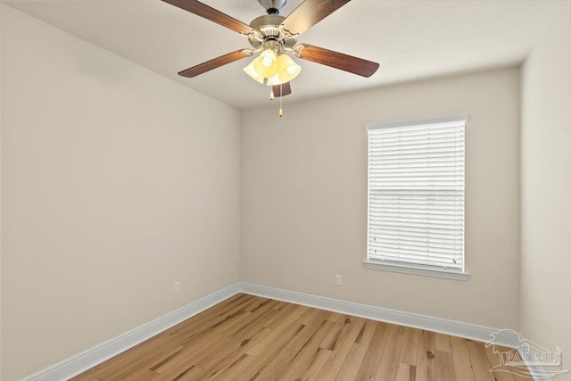 8868 Sanderling Ln, Navarre, FL 32566 - unfurnished room featuring light wood-type flooring, baseboards, and healthy amount of natural light