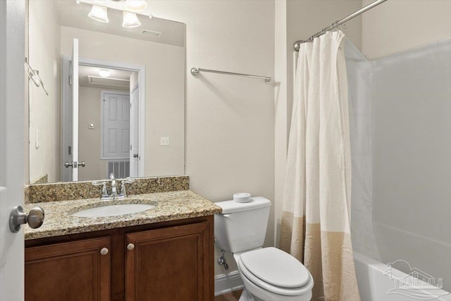 8868 Sanderling Ln, Navarre, FL 32566 - full bathroom featuring vanity, toilet, and shower / bath combo