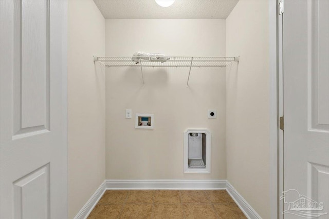 8868 Sanderling Ln, Navarre, FL 32566 - laundry area featuring washer hookup, electric dryer hookup, and baseboards