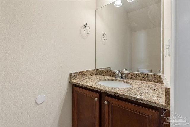 8868 Sanderling Ln, Navarre, FL 32566 - bathroom featuring vanity and toilet