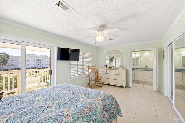 1650 Bulevar Menor, Pensacola Beach, FL 32561 - bedroom with baseboards, access to exterior, light tile patterned flooring, and visible vents