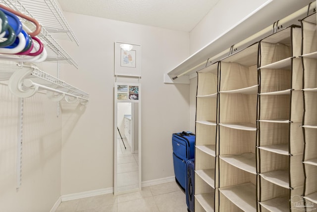 1650 Bulevar Menor, Pensacola Beach, FL 32561 - spacious closet featuring tile patterned floors