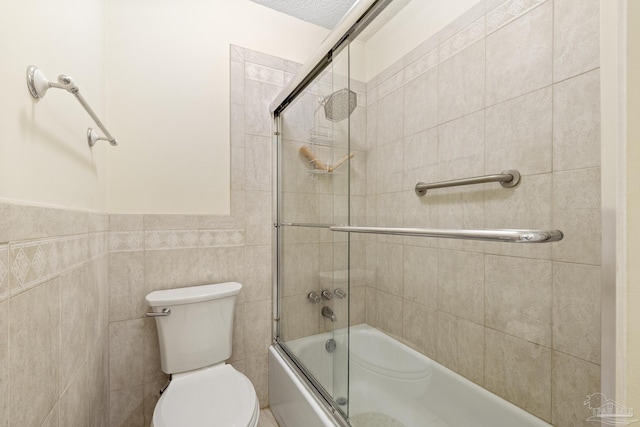 1650 Bulevar Menor, Pensacola Beach, FL 32561 - full bath featuring tile walls, toilet, and shower / bath combination with glass door