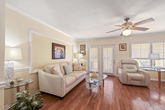 1650 Bulevar Menor, Pensacola Beach, FL 32561 - living area featuring ceiling fan, plenty of natural light, and a textured ceiling