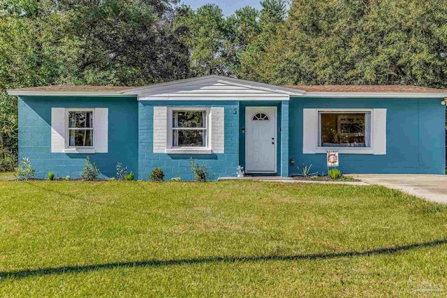 5 Norwood Dr, Pensacola, FL 32506 - ranch-style home featuring a front yard and concrete block siding