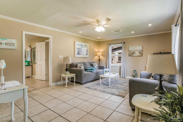 tiled living room with ornamental molding and ceiling fan