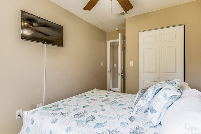 bedroom with a closet and ceiling fan