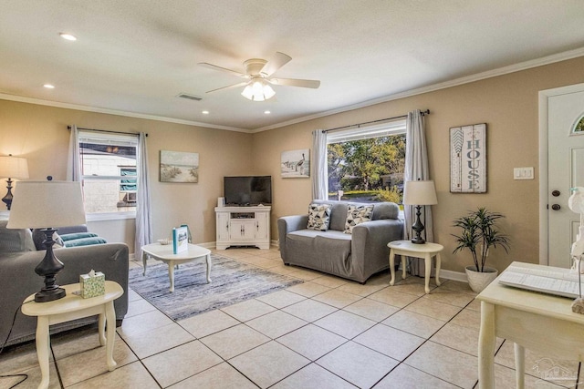 tiled living room featuring crown molding and ceiling fan