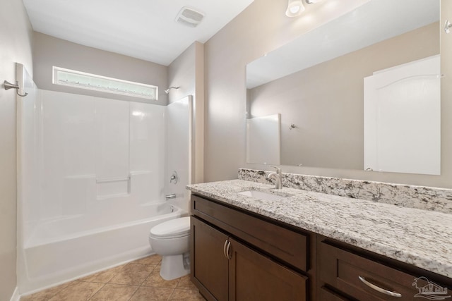 full bathroom featuring vanity, tile patterned flooring, shower / bathing tub combination, and toilet