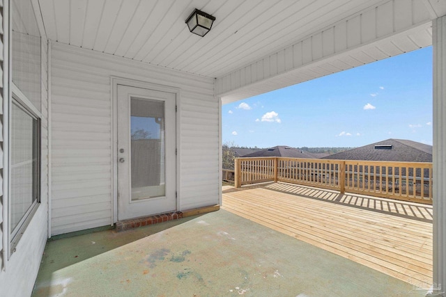 wooden terrace featuring a patio